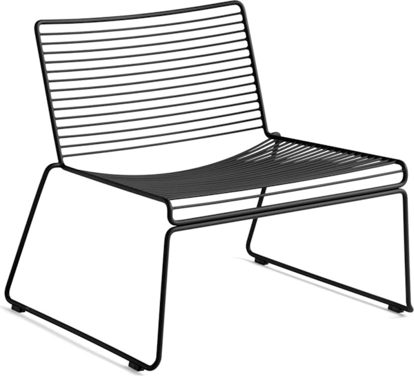 A three quarter side view of a black Hee Lounge Chair.